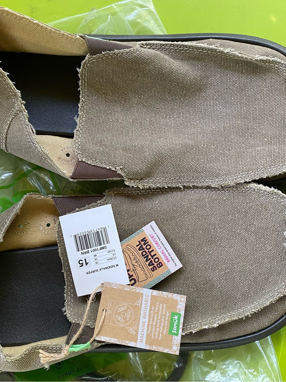 Sanuk Tan Canvas Slip-On Shoes with Brown Trim